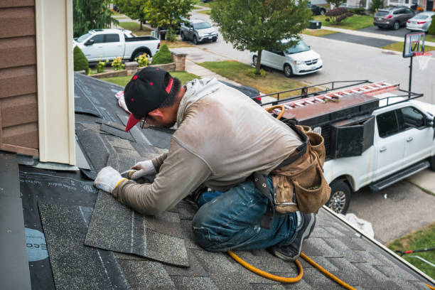 Professional Emergency Roof Repair technician working in Olivet, MI